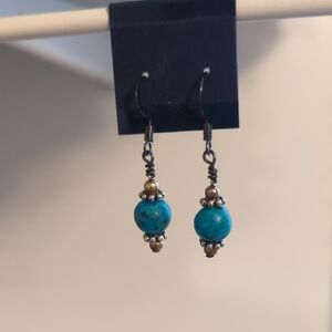 Blue and Silver Dangle Earrings with Elegant Design